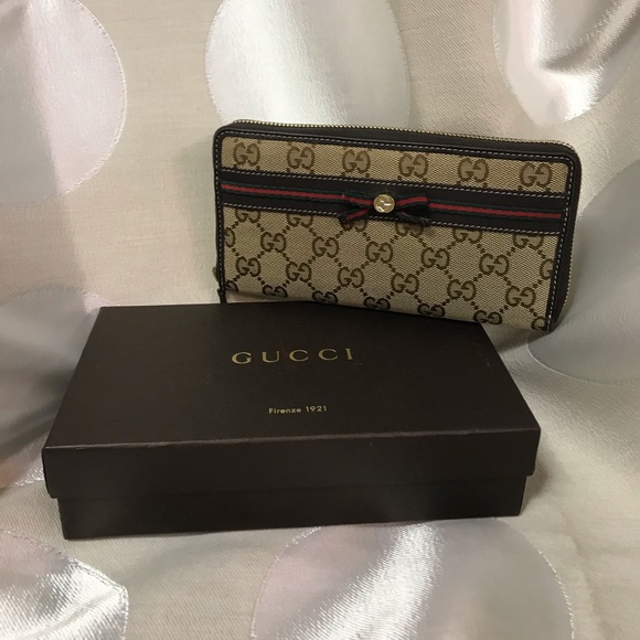 Gucci Handbags - Gucci Mayfair Zip Wallet